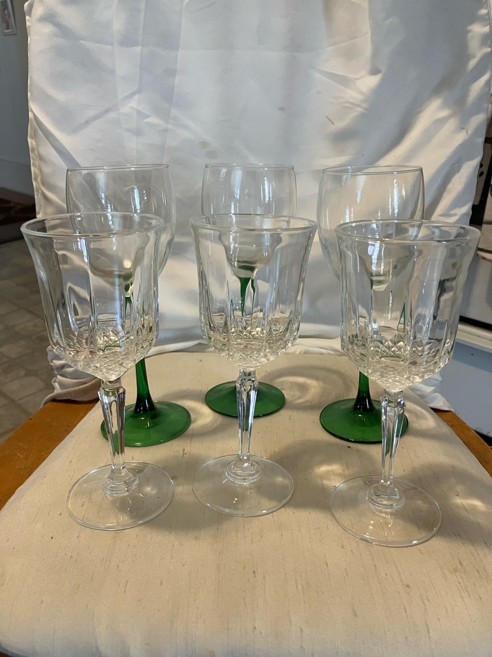 Great deal.  Odd lots of 3 each crystal wine glasses. 3 green base are from